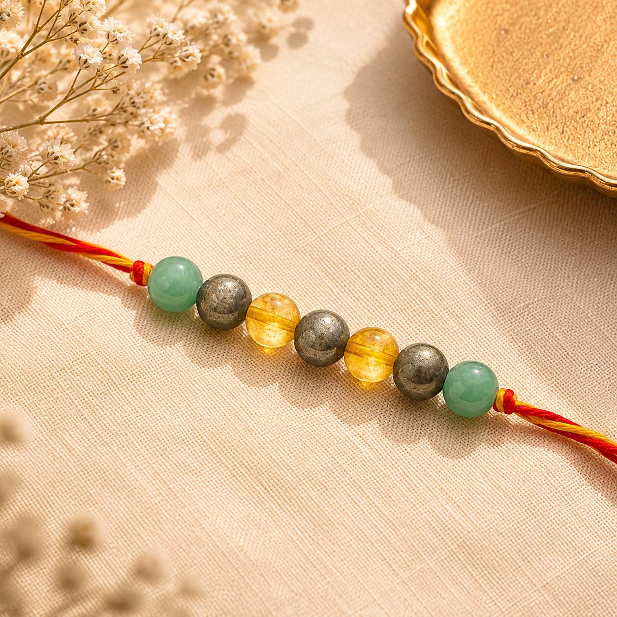 green_pyrite_citrine_rakhi_250kb